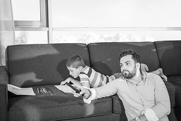 Image showing Happy Young Family Playing Together on sofa