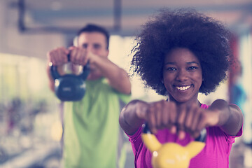 Image showing couple  workout with weights at  crossfit gym