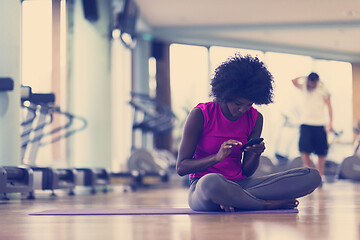 Image showing african american woman exercise yoga in gym