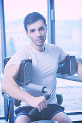 Image showing man running on the treadmill