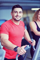 Image showing man running on the treadmill