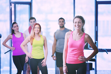 Image showing Group of people exercising at the gym