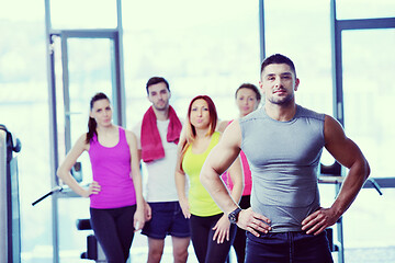 Image showing Group of people exercising at the gym