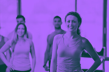 Image showing Group of people exercising at the gym