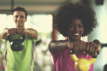 Image showing couple  workout with weights at  crossfit gym