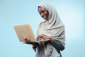 Image showing Portrait Of Female University Student Working on laptop