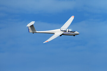 Image showing glider up in the blue sky