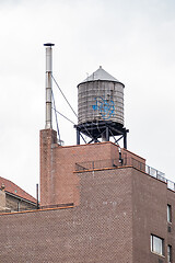 Image showing typical water tank on the roof of a building in New York City