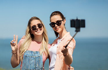 Image showing teenage girls or friends taking selfie in summer