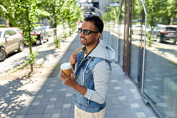 Image showing indian man with bag and takeaway coffee in city