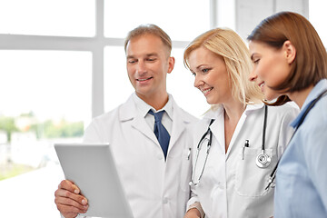 Image showing group of doctors with tablet computer at hospital