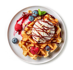 Image showing belgian waffle with ice cream and fresh berries