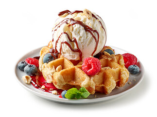 Image showing belgian waffle with ice cream and fresh berries