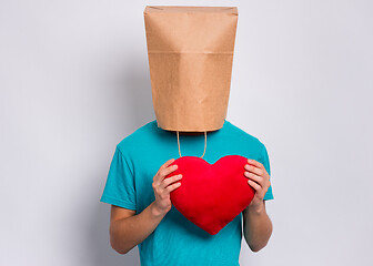 Image showing Boy with paper bag over head