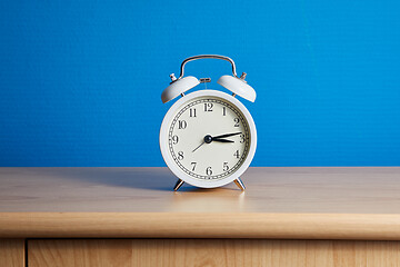 Image showing Alarm Clock on a Shelf