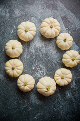 Image showing Composition of cute white Baby boo mini pumpkins placed in circl