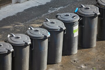 Image showing Dust bin containers on the street