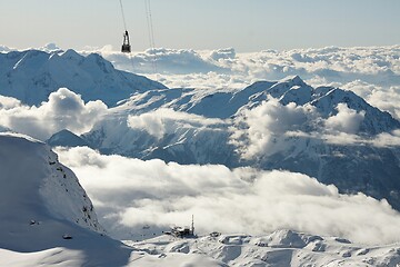 Image showing Ski lift cabin in snowy mountain landscape