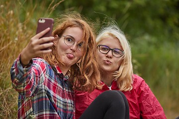 Image showing Girls making faces for selfie
