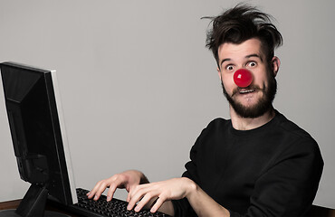 Image showing Happy man on red nose day.