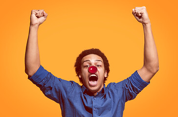 Image showing Happy afro man on red nose day.