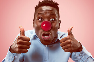 Image showing Happy afro man on red nose day.