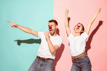 Image showing Happy man and woman at red nose day.