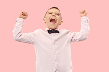 Image showing Winning success man happy ecstatic celebrating being a winner. Dynamic energetic image of male model