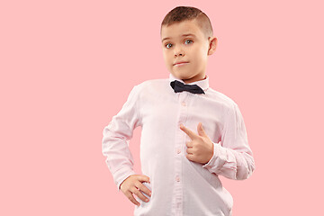 Image showing The teen boy point you. portrait on pink background.