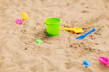 Image showing bucket and sand toys on beach or in sandbox