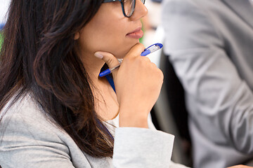 Image showing close up of businesswoman at business conference