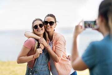 Image showing teenage girls or best friends being photographed