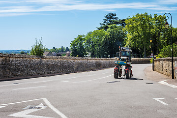 Image showing MEURSAULT, BURGUNDY, FRANCE- JULY 9, 2020: Mechanical grape harvester in the Meursault streets, south west of France, Bordeaux