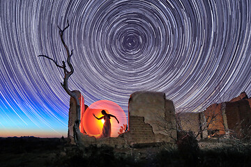 Image showing Person Light Painted in the Desert Under the Night Sky