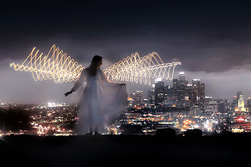 Image showing Colorful Long Exposure Image of a Woman