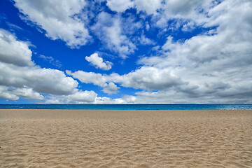 Image showing Empty Beach Shot with Sky Clouds and Sand in Maui Hawaii