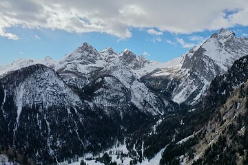 Image showing aerial snow covered mountain peaks in alps at winter 