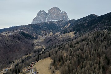 Image showing aerial snow covered mountain peaks in alps at winter 