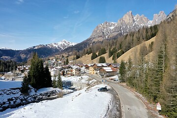 Image showing aerial snow covered mountain peaks in alps at winter 