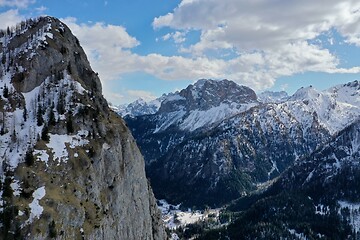 Image showing aerial snow covered mountain peaks in alps at winter 