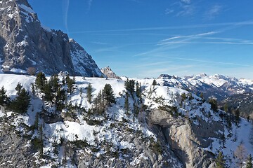 Image showing aerial snow covered mountain peaks in alps at winter 