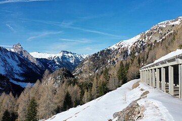 Image showing aerial snow covered mountain peaks in alps at winter 