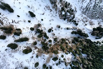 Image showing aerial snow covered mountain peaks in alps at winter 