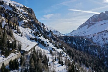 Image showing aerial snow covered mountain peaks in alps at winter 