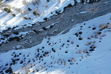 Image showing aerial snow covered mountain peaks in alps at winter 