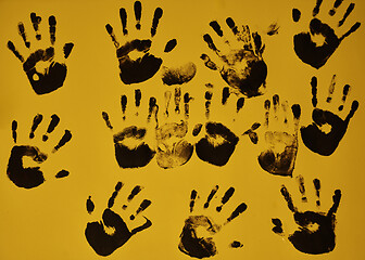 Image showing creative children black handprints painting