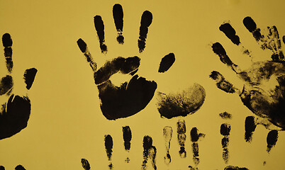 Image showing creative children black handprints painting