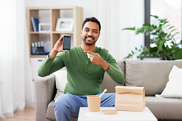 Image showing indian man using smartphone for food delivery