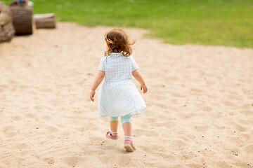 Image showing little girl at children\'s playground in summer