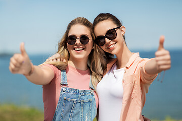 Image showing teenage girls or best friends at seaside in summer